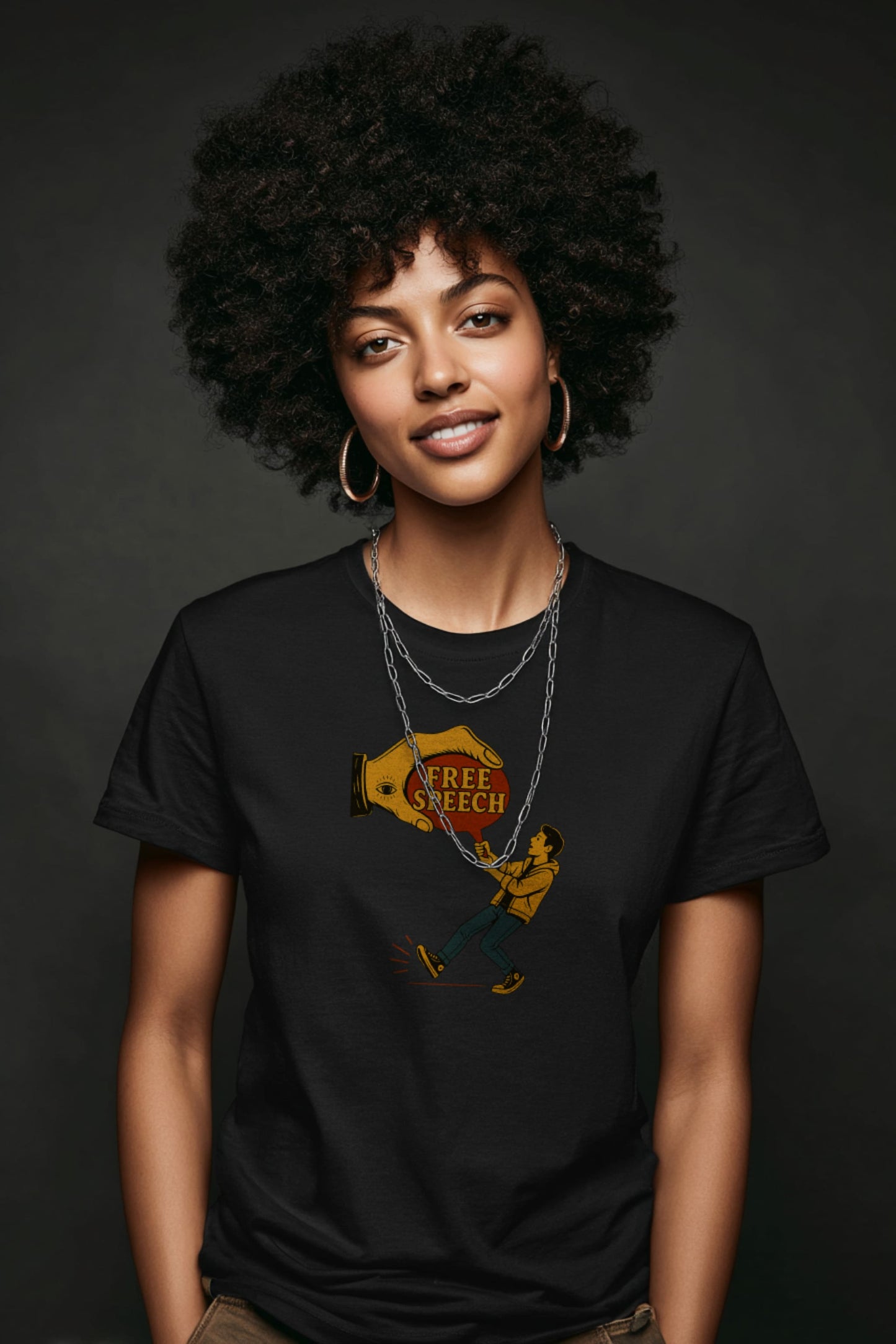 Smiling woman with natural afro wearing Free Speech graphic t-shirt, styled as casual activist streetwear.