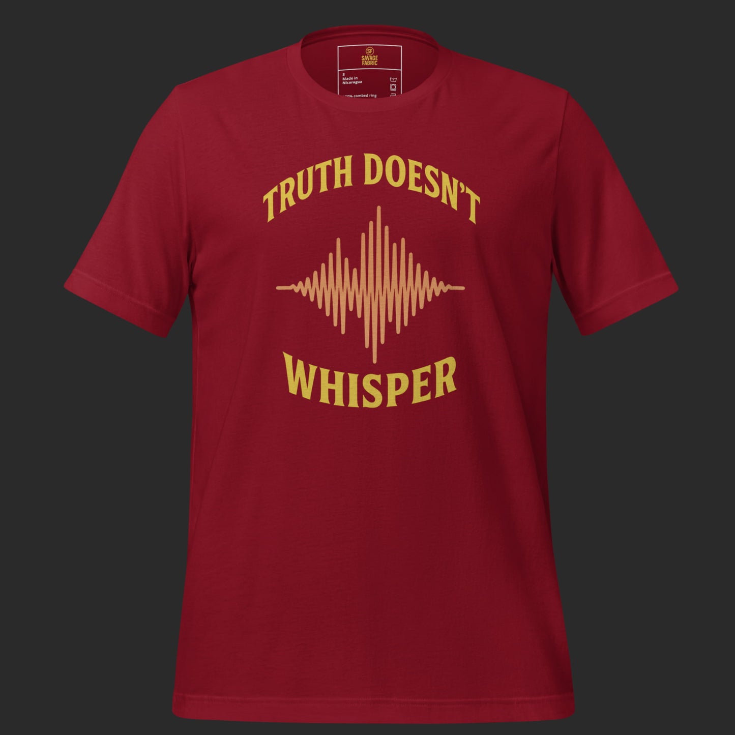 Truth Doesn’t Whisper graphic t-shirt in bold red with gold soundwave design