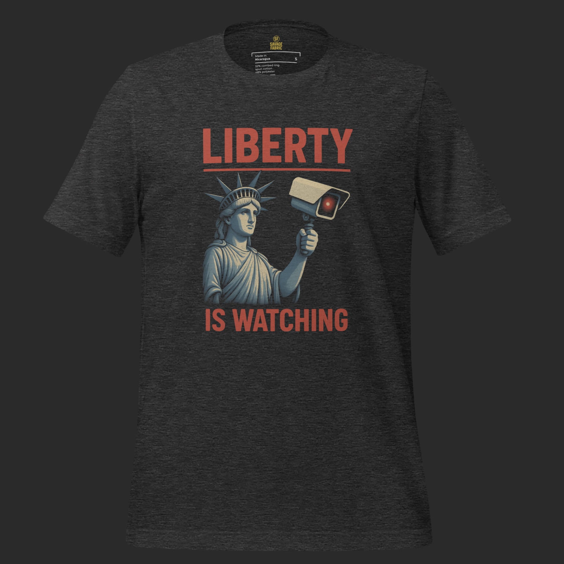 Dark heather Liberty Is Watching t-shirt with Statue of Liberty protest design and bold red slogan