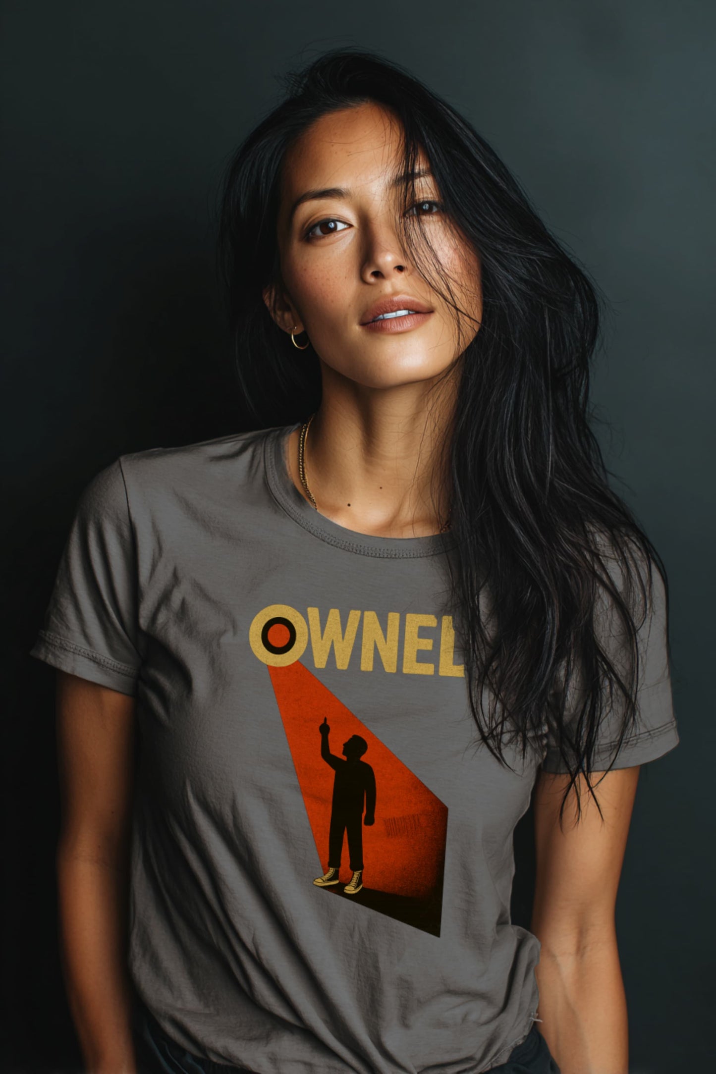 Man wearing Owned t-shirt with bold anti-surveillance protest artwork